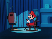 Mario playing his Famicom.