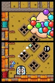 The Blue Yoshi takes aim at Gilbert the Gooey.
