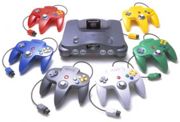 The original Nintendo 64, and its six controller colors.