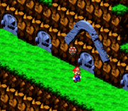 Mario outside the Monstro Town item shop.