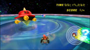 Diddy Kong battles a Spiky Topman in Mario Kart Wii.